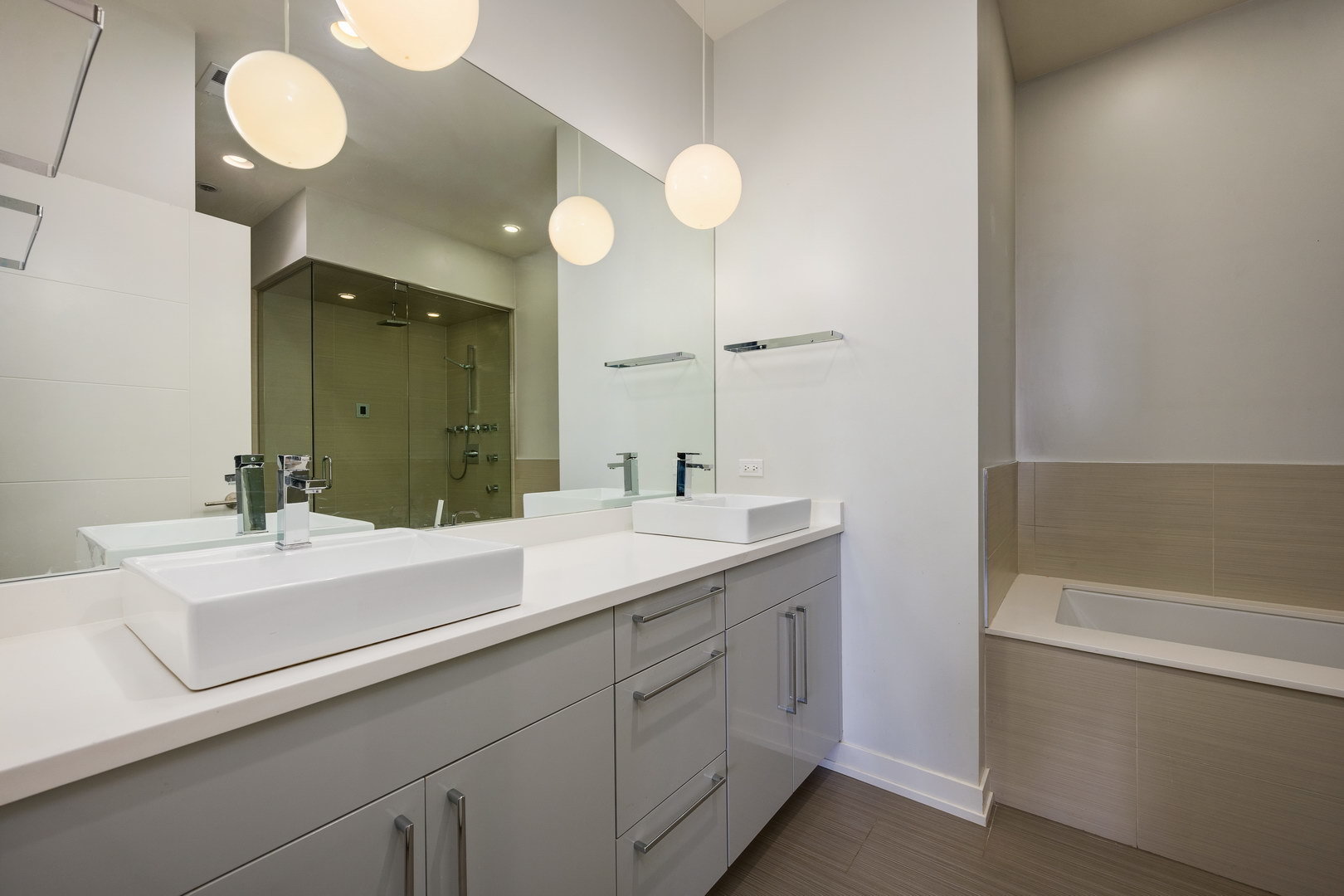 1832 West Rice Street, Unit 2 Chicago, IL 60622 - Photo 15 of 29 a bathroom with a sink and a mirror