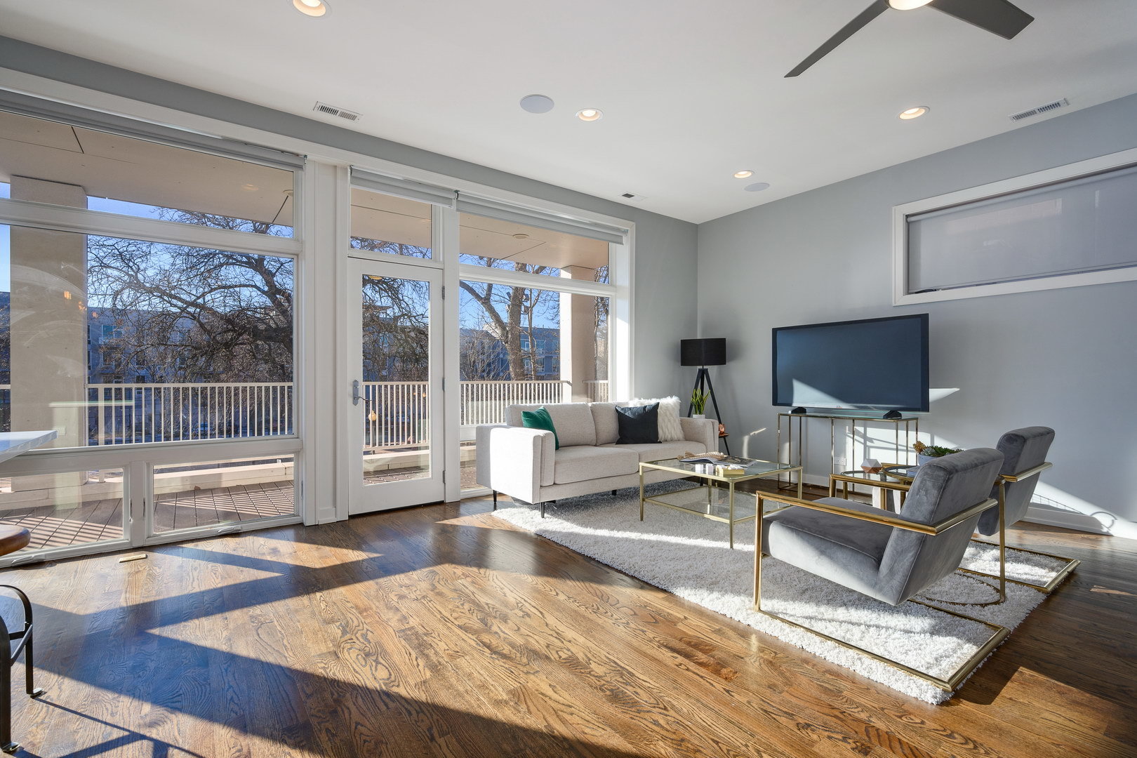 1832 West Rice Street, Unit 2 Chicago, IL 60622 - Photo 5 of 29 a living room with fireplace furniture and a flat screen tv
