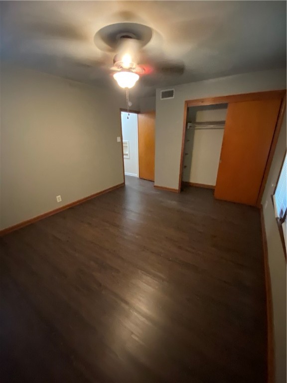 925 Stirman Street Corpus Christi, TX 78411 - Photo 14 of 16 an empty room with wooden floor and windows