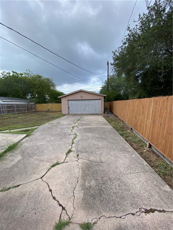 925 Stirman Street Corpus Christi, TX 78411 - Photo 15 of 16 a view of swimming pool with a yard