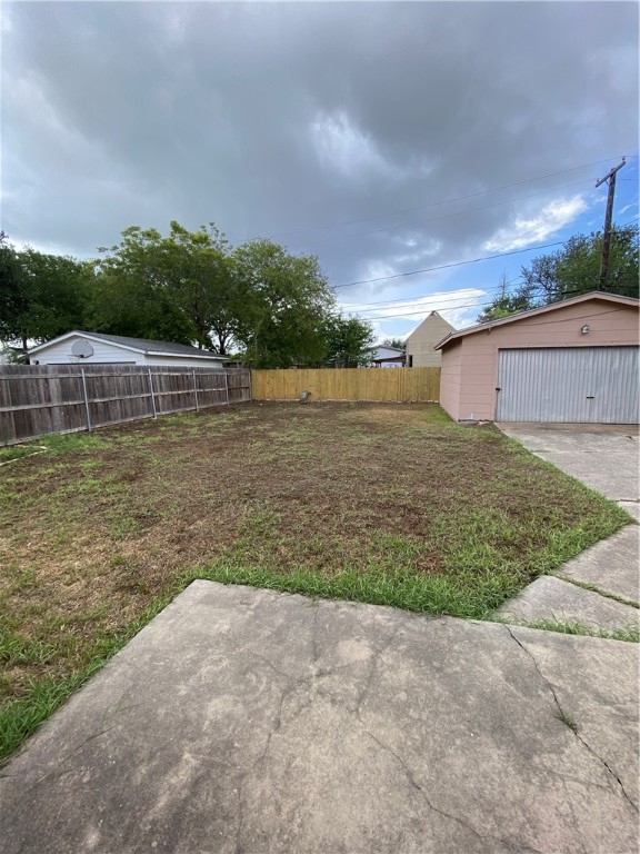 925 Stirman Street Corpus Christi, TX 78411 - Photo 16 of 16 a view of a lake with a house in the background