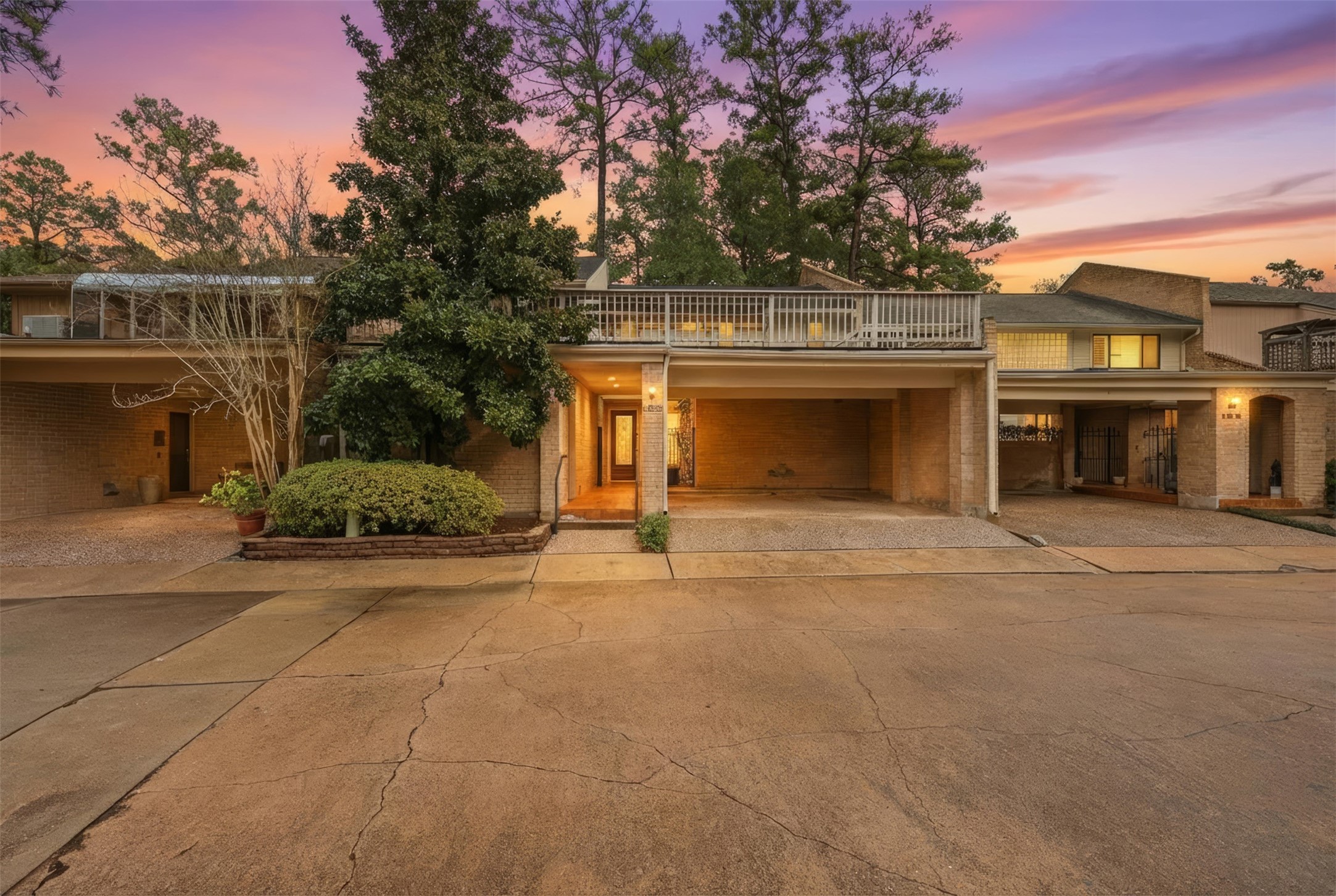 201 Vanderpool Lane, Unit 122 Houston, TX 77024 - Photo 2 of 35 front view of a house with a street
