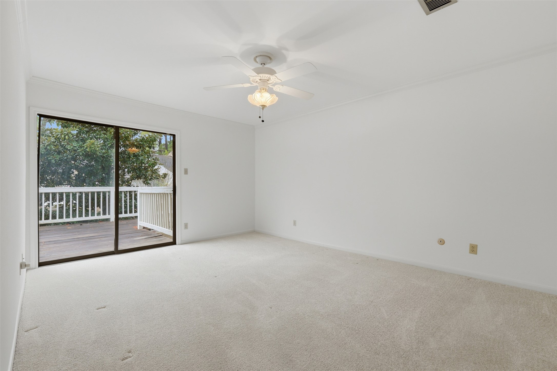 201 Vanderpool Lane, Unit 122 Houston, TX 77024 - Photo 23 of 35 wooden floor in an empty room with a window