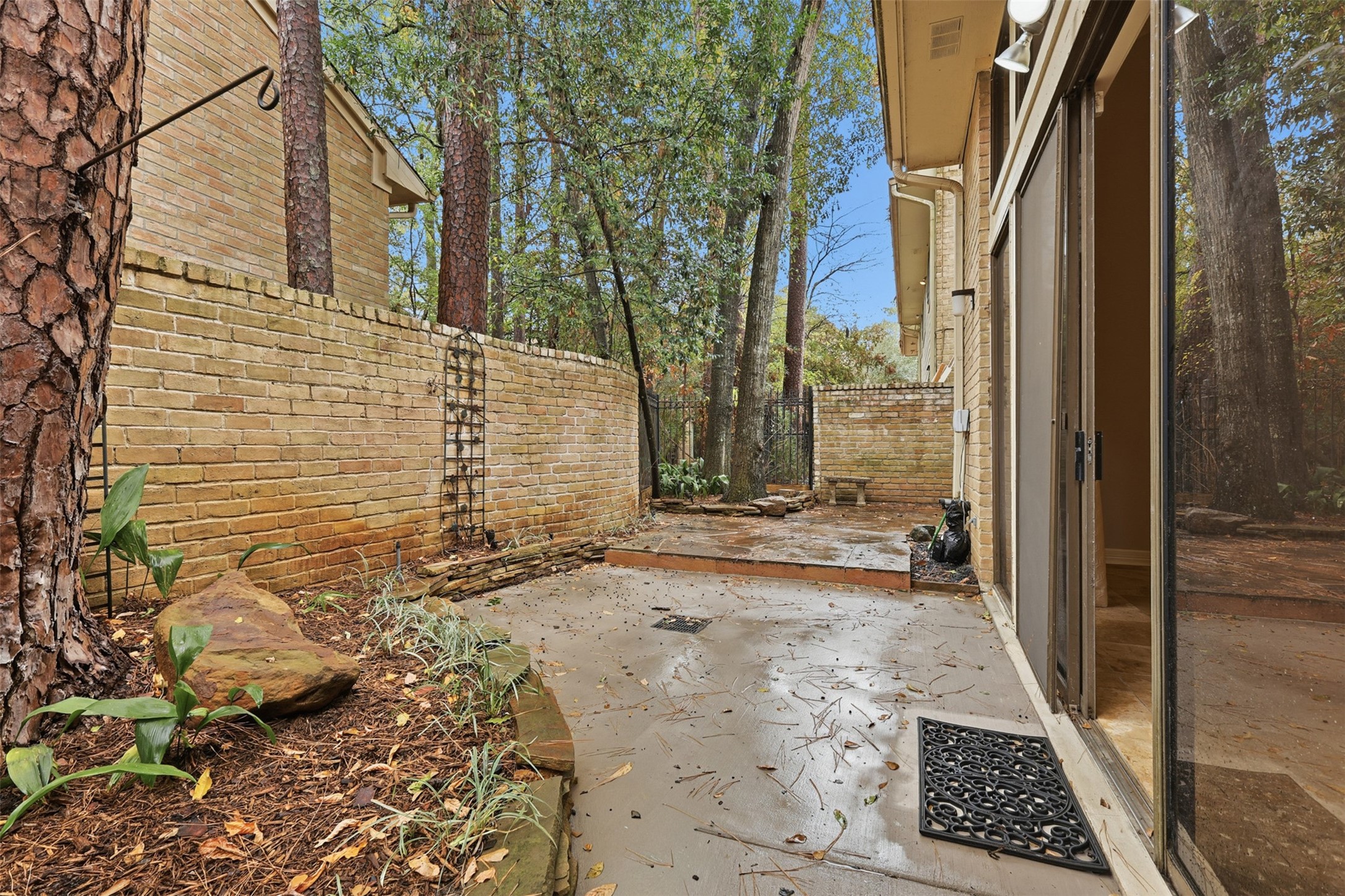 201 Vanderpool Lane, Unit 122 Houston, TX 77024 - Photo 27 of 35 a view of a pathway of a house
