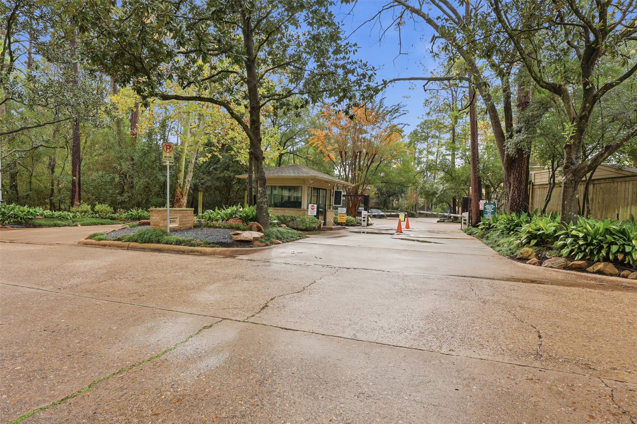201 Vanderpool Lane, Unit 122 Houston, TX 77024 - Photo 31 of 35 a building with trees in front of it
