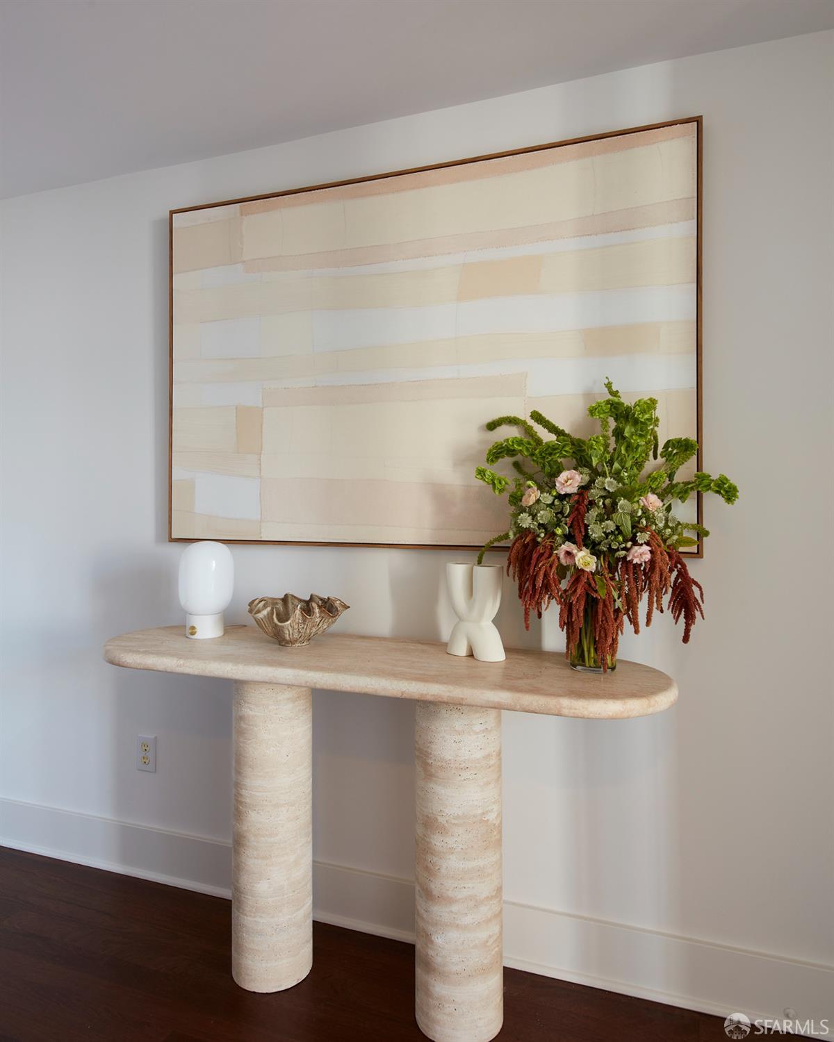 999 16th Street, Unit 11 San Francisco, CA 94107 - Photo 12 of 15 a close view of sink and a potted plant on a counter top