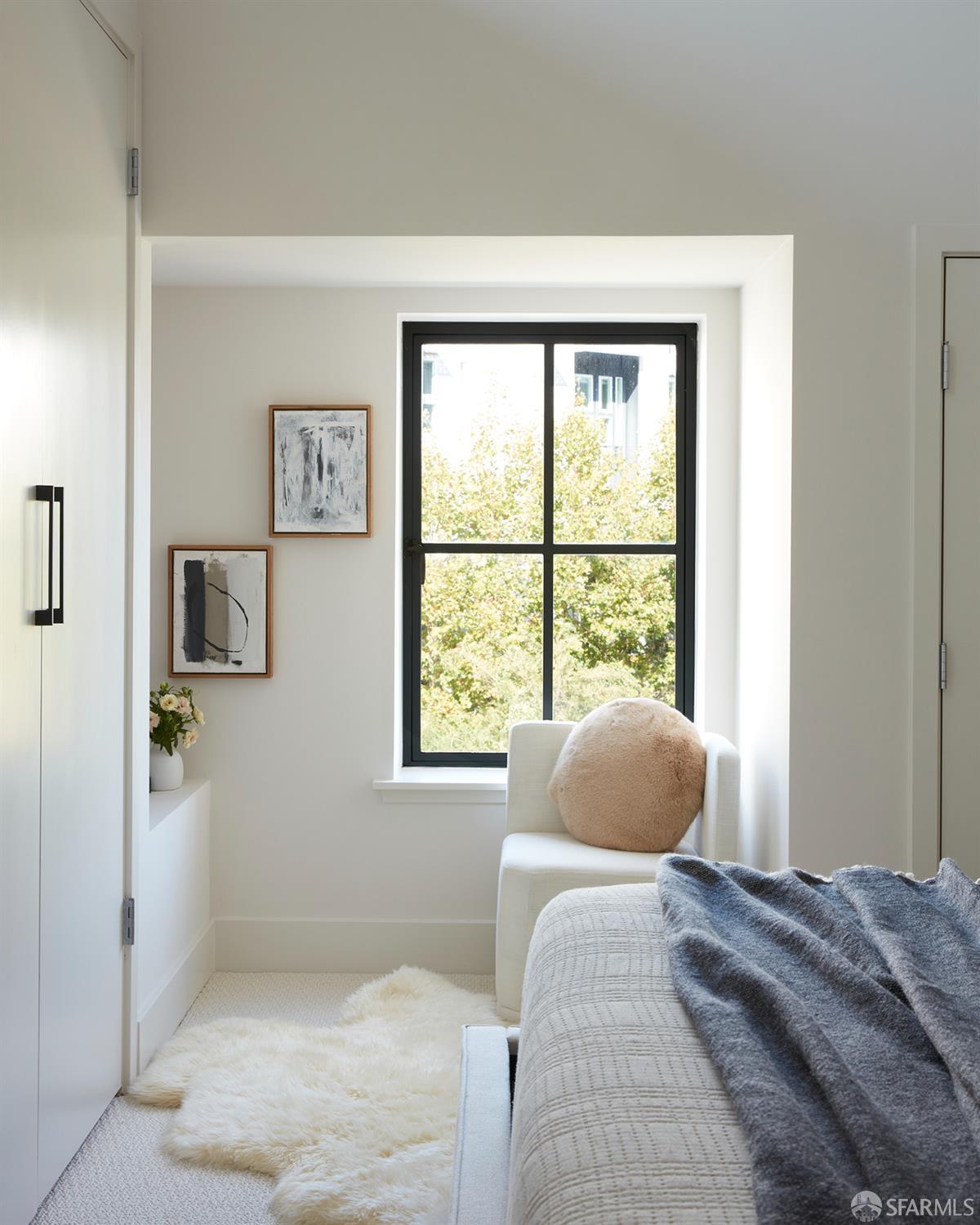 999 16th Street, Unit 11 San Francisco, CA 94107 - Photo 14 of 15 a bedroom with a bed and a window