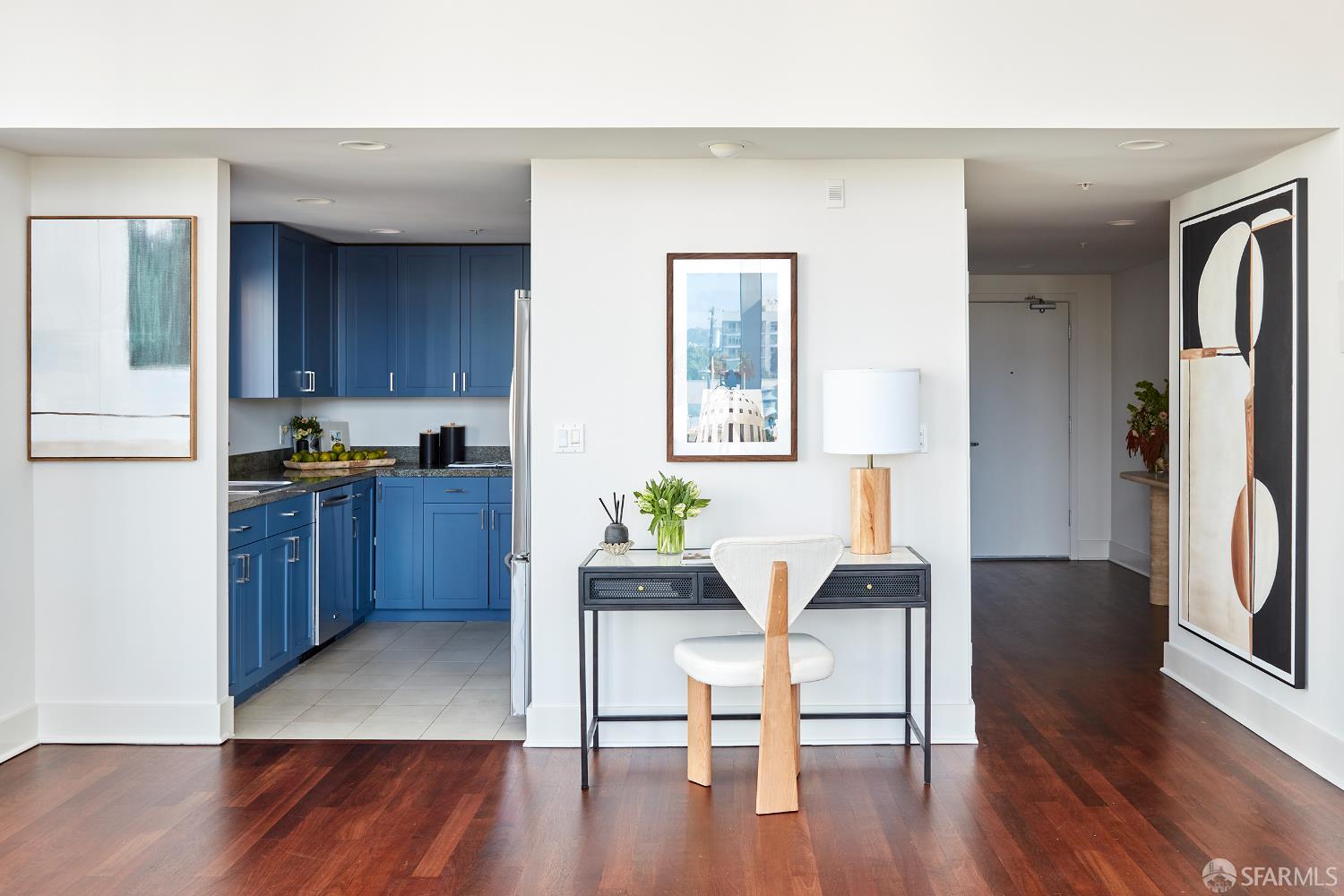 999 16th Street, Unit 11 San Francisco, CA 94107 - Photo 5 of 15 a living room with wooden floors and furniture