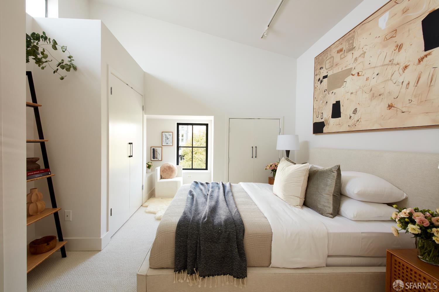 999 16th Street, Unit 11 San Francisco, CA 94107 - Photo 8 of 15 a bedroom with a bed and a window