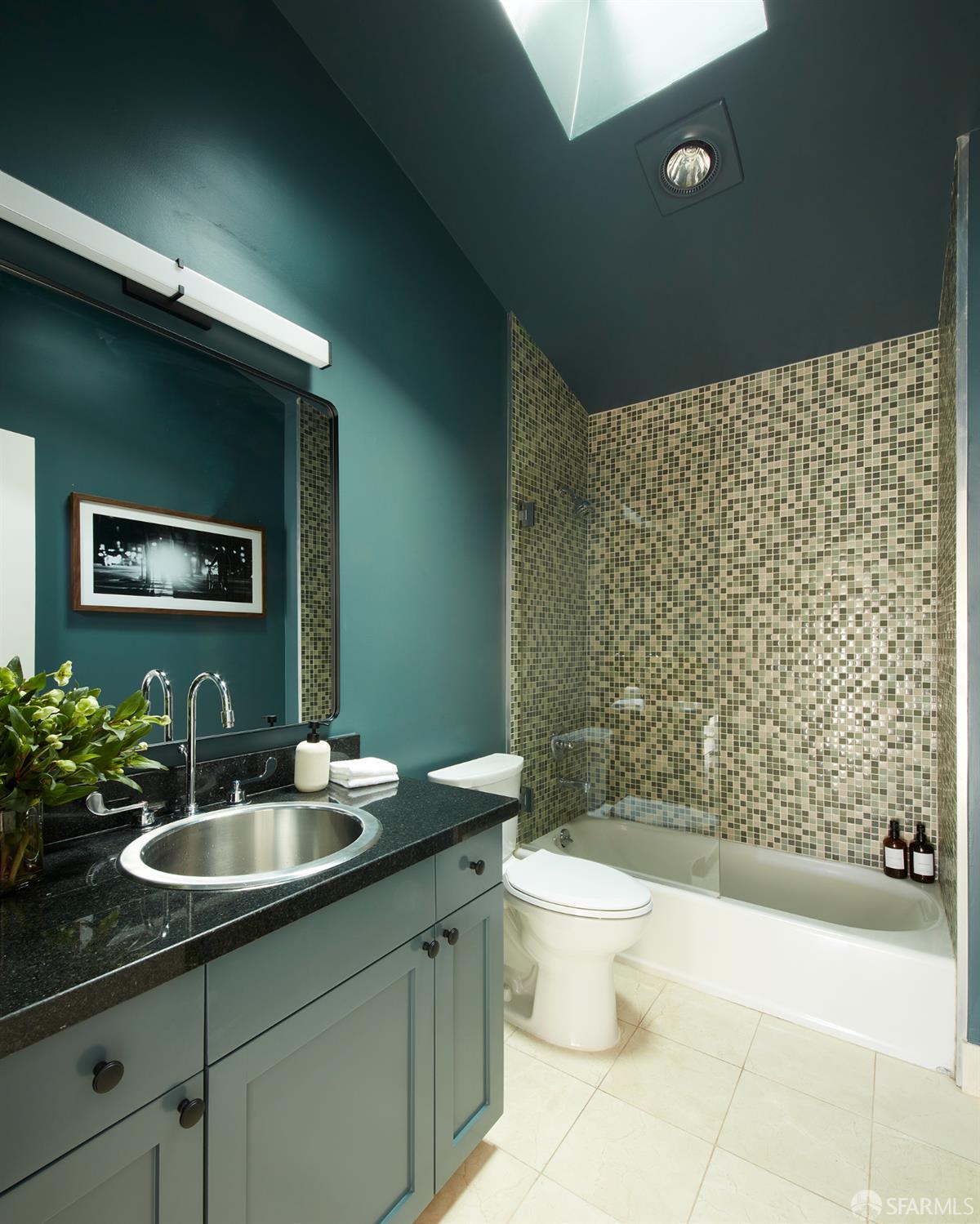 999 16th Street, Unit 11 San Francisco, CA 94107 - Photo 10 of 15 a bathroom with a sink a toilet and shower