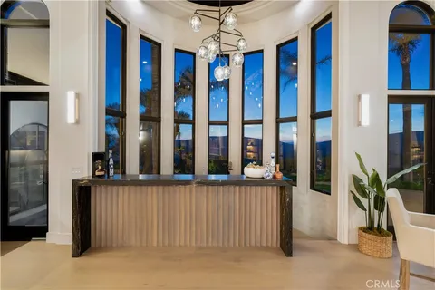 a kitchen with granite countertop a stove and a sink