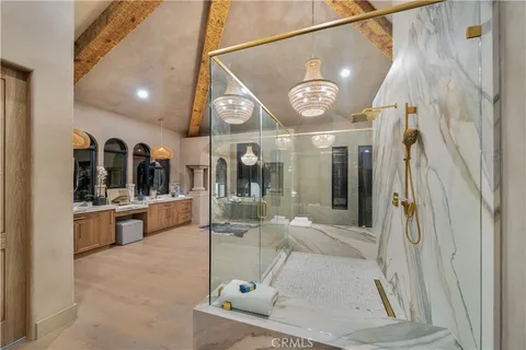 a view of a house with a swimming pool and a porch