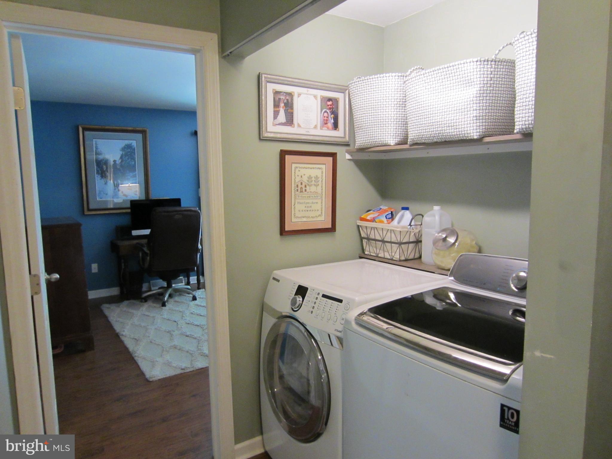 839 Brandywine Road Downingtown, PA 19335 - Photo 13 of 32 Convenient first floor laundry w built-in shelving