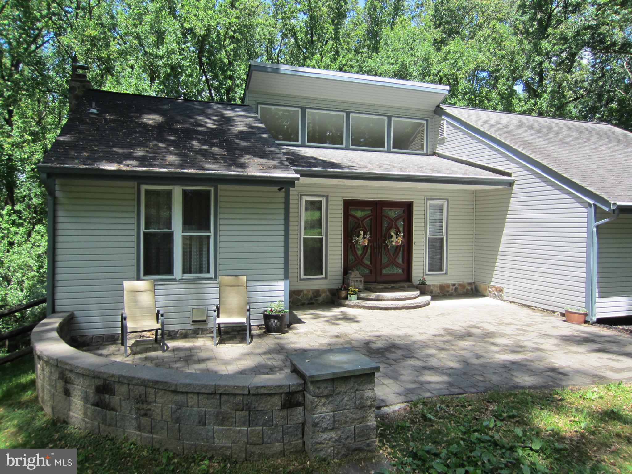 839 Brandywine Road Downingtown, PA 19335 - Photo 3 of 32 ...features extensive stone hardscaping features.