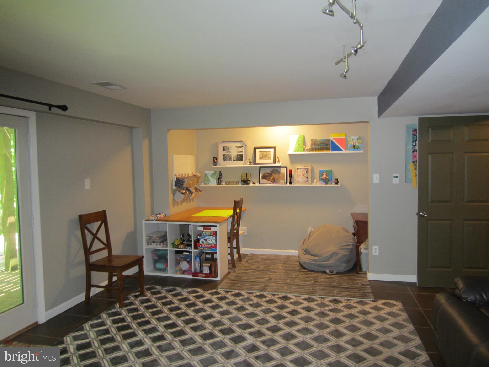 839 Brandywine Road Downingtown, PA 19335 - Photo 24 of 32 Family Room has heated floors and alcove w shelves