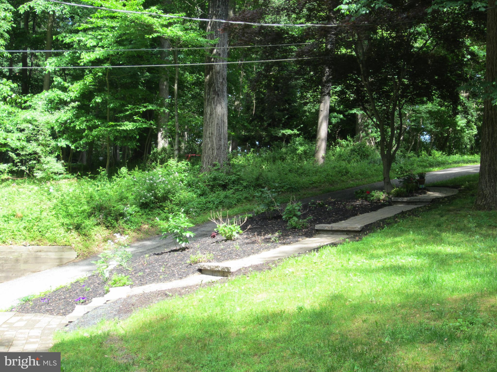 839 Brandywine Road Downingtown, PA 19335 - Photo 27 of 32 Stone pathways by driveway and to front entry