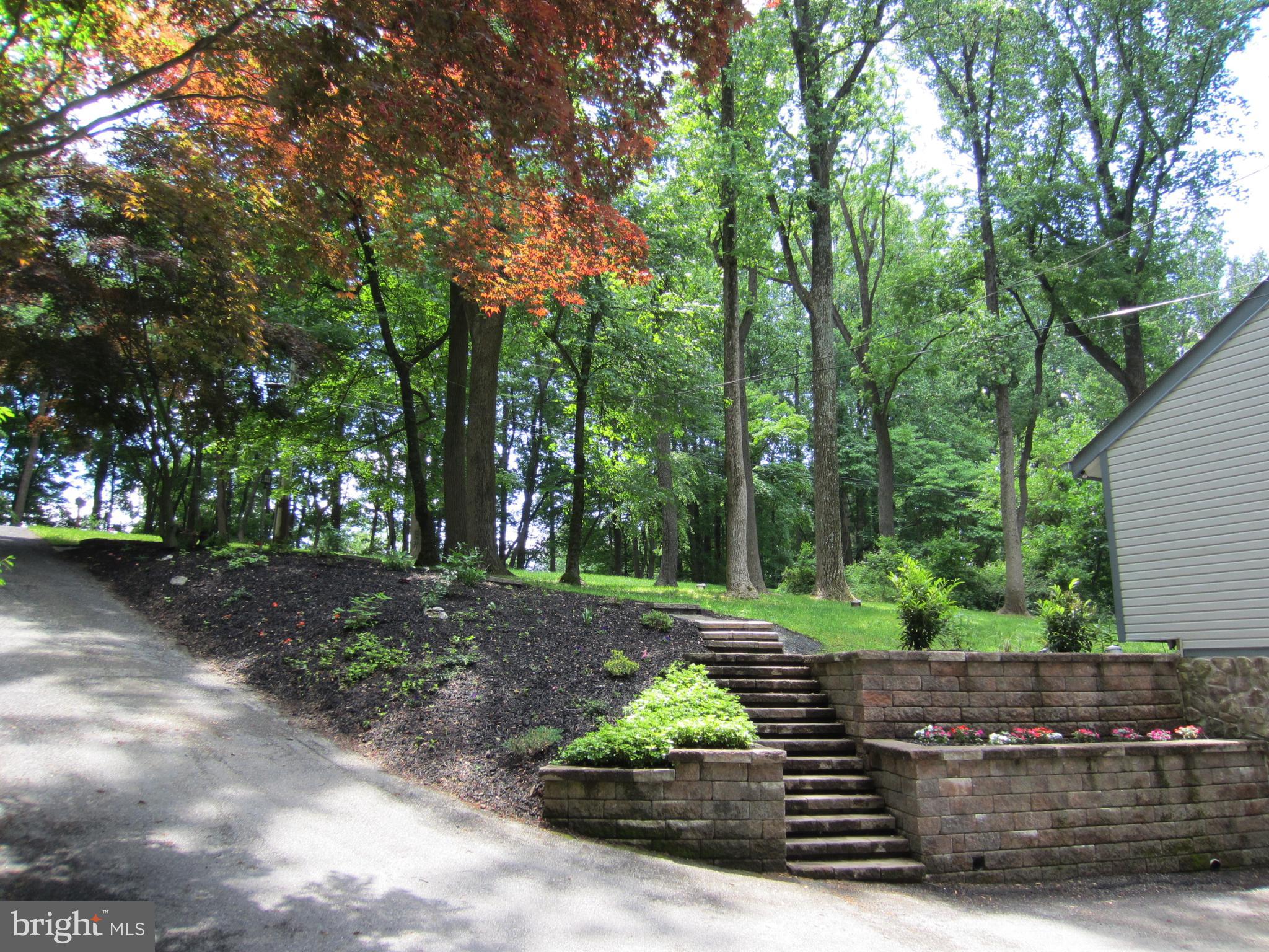 839 Brandywine Road Downingtown, PA 19335 - Photo 28 of 32 Lovely stone hardscaping graces this property