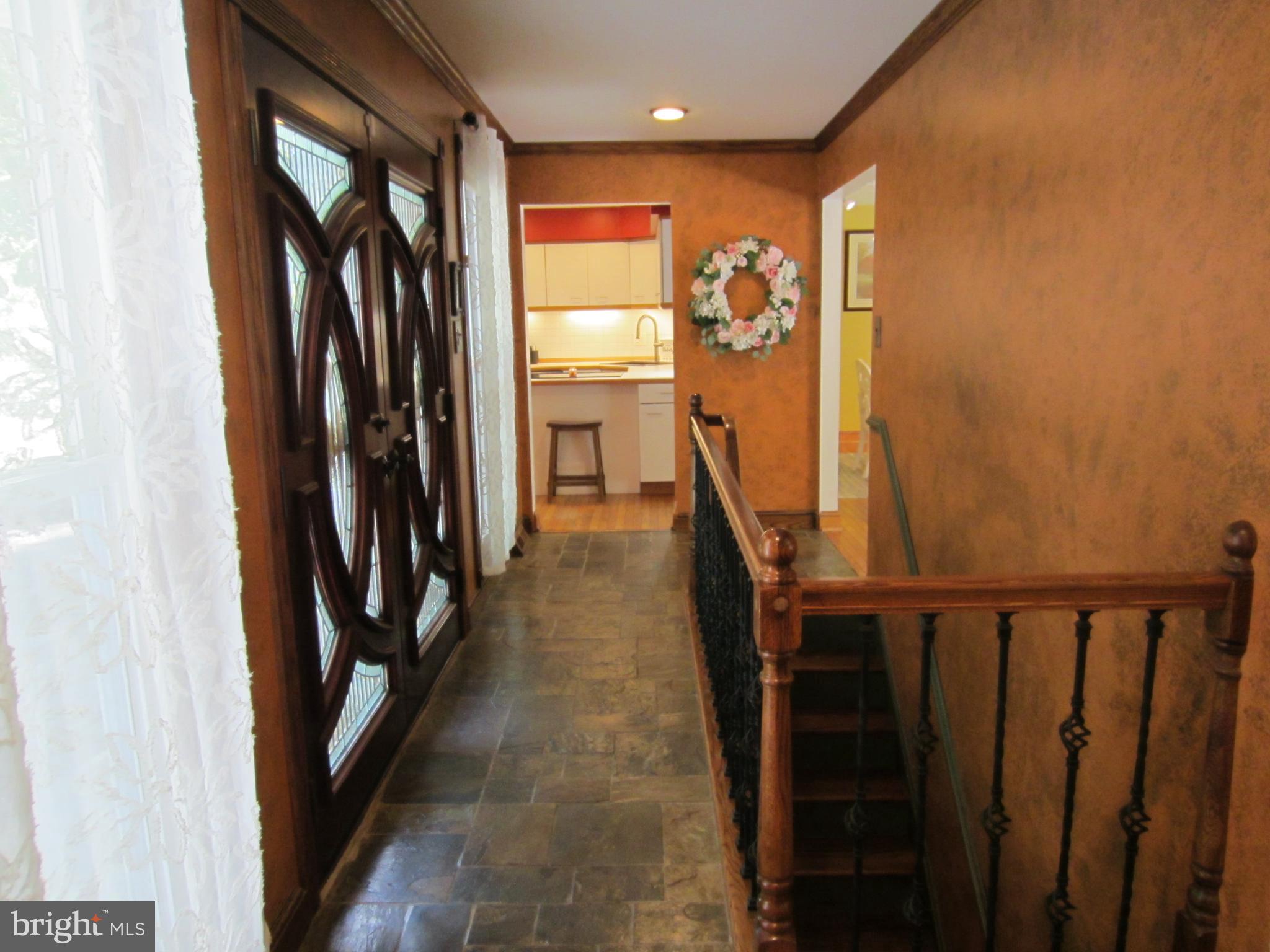 839 Brandywine Road Downingtown, PA 19335 - Photo 5 of 32 Double front doors open into wide tiled foyer