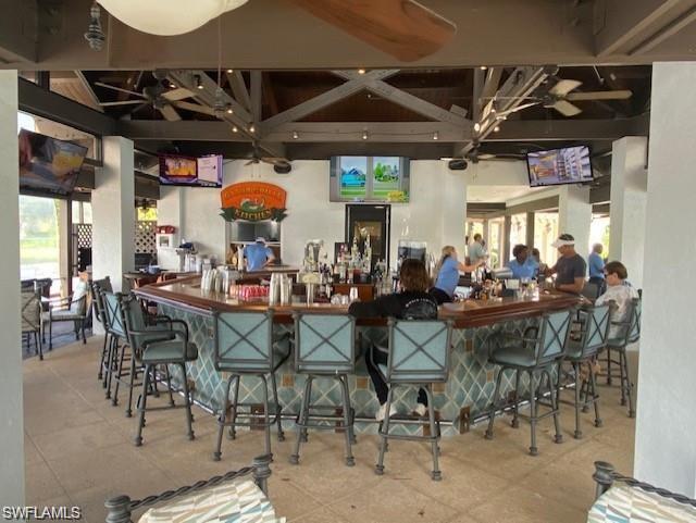 4680 Hawks Nest Way, Unit D103 Naples, FL 34114 - Photo 27 of 41 a view of a bar restaurant