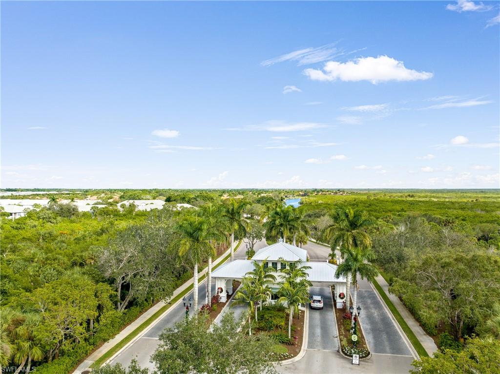 4680 Hawks Nest Way, Unit D103 Naples, FL 34114 - Photo 40 of 41 a view of a city from a balcony