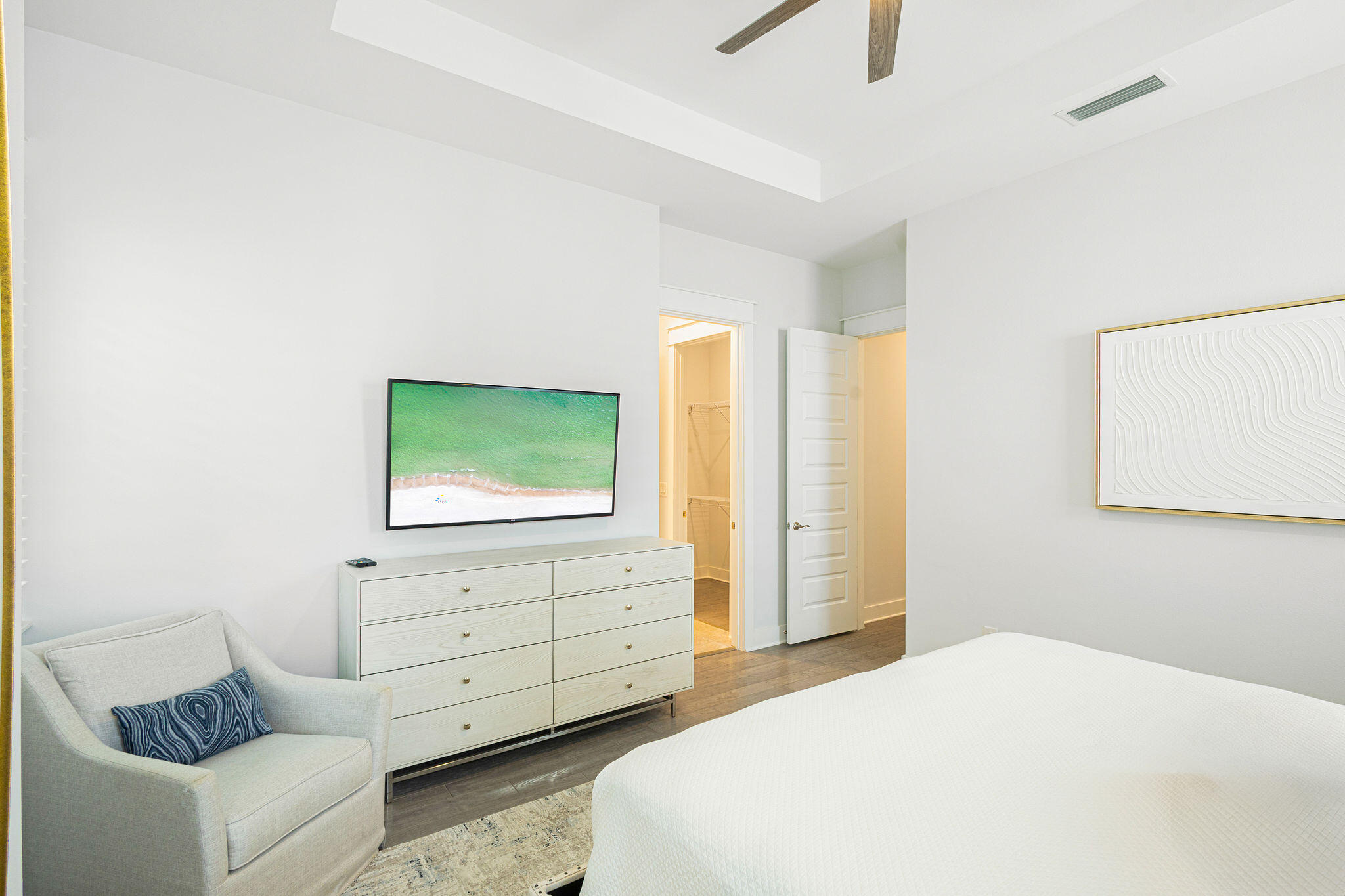 209 Milestone Dr Inlet Beach, Unit A Inlet Beach, FL 32461 - Photo 24 of 65 a bedroom with a bed and couch