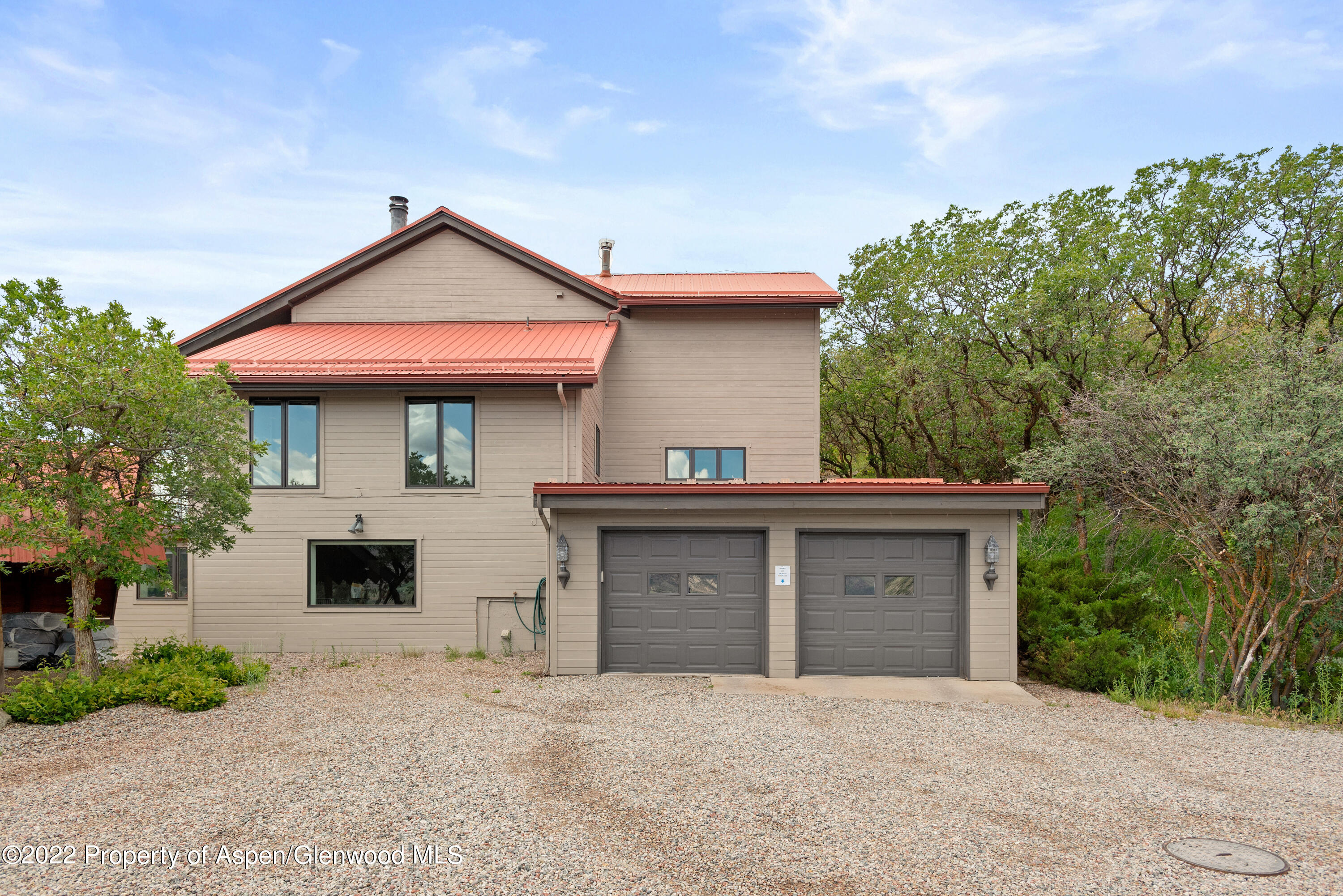540 Upper Ranch Road Aspen, CO 81611 - Photo 17 of 24 a front view of a house with garage