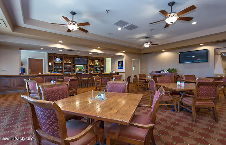7106 Lynx Wagon Road Prescott Valley, AZ 86314 - Photo 22 of 26 a view of a dining area with furniture