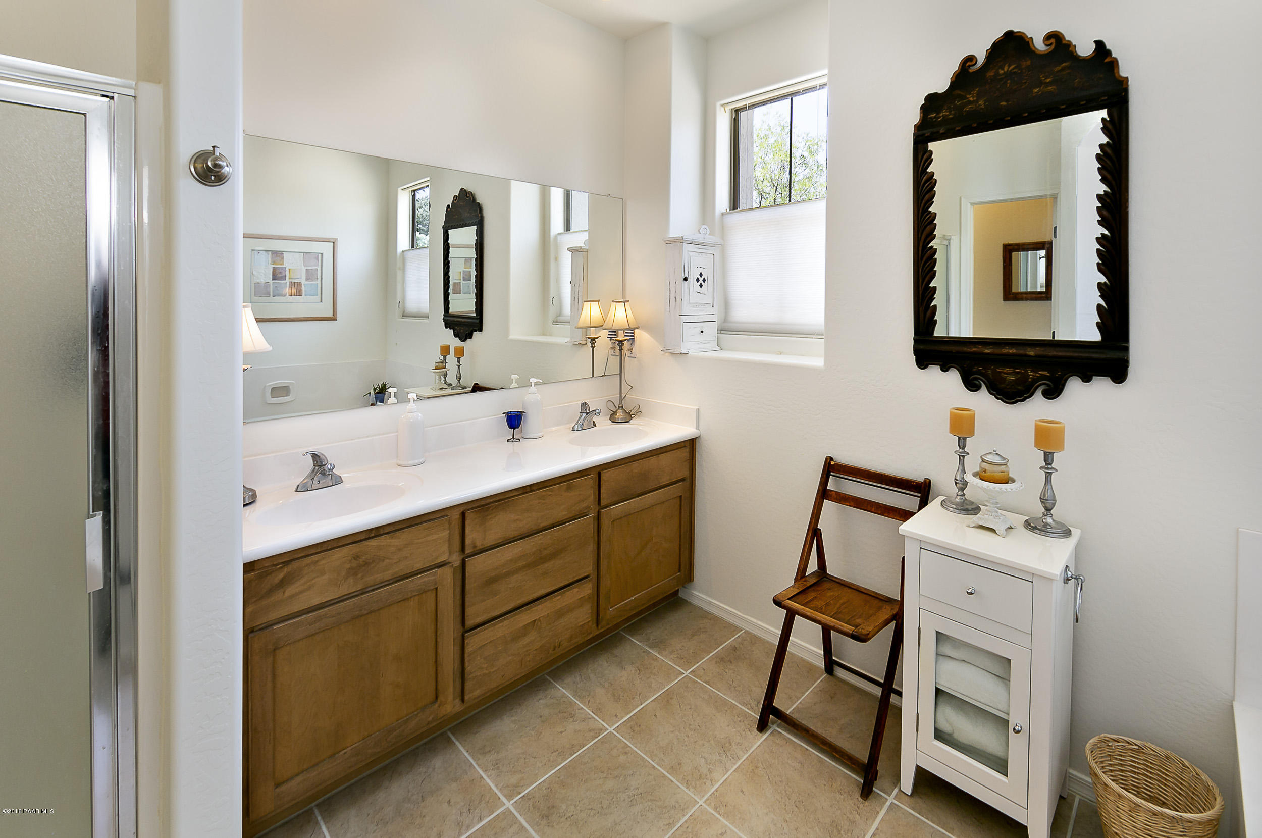 7106 Lynx Wagon Road Prescott Valley, AZ 86314 - Photo 9 of 26 a bathroom with a toilet sink and mirror