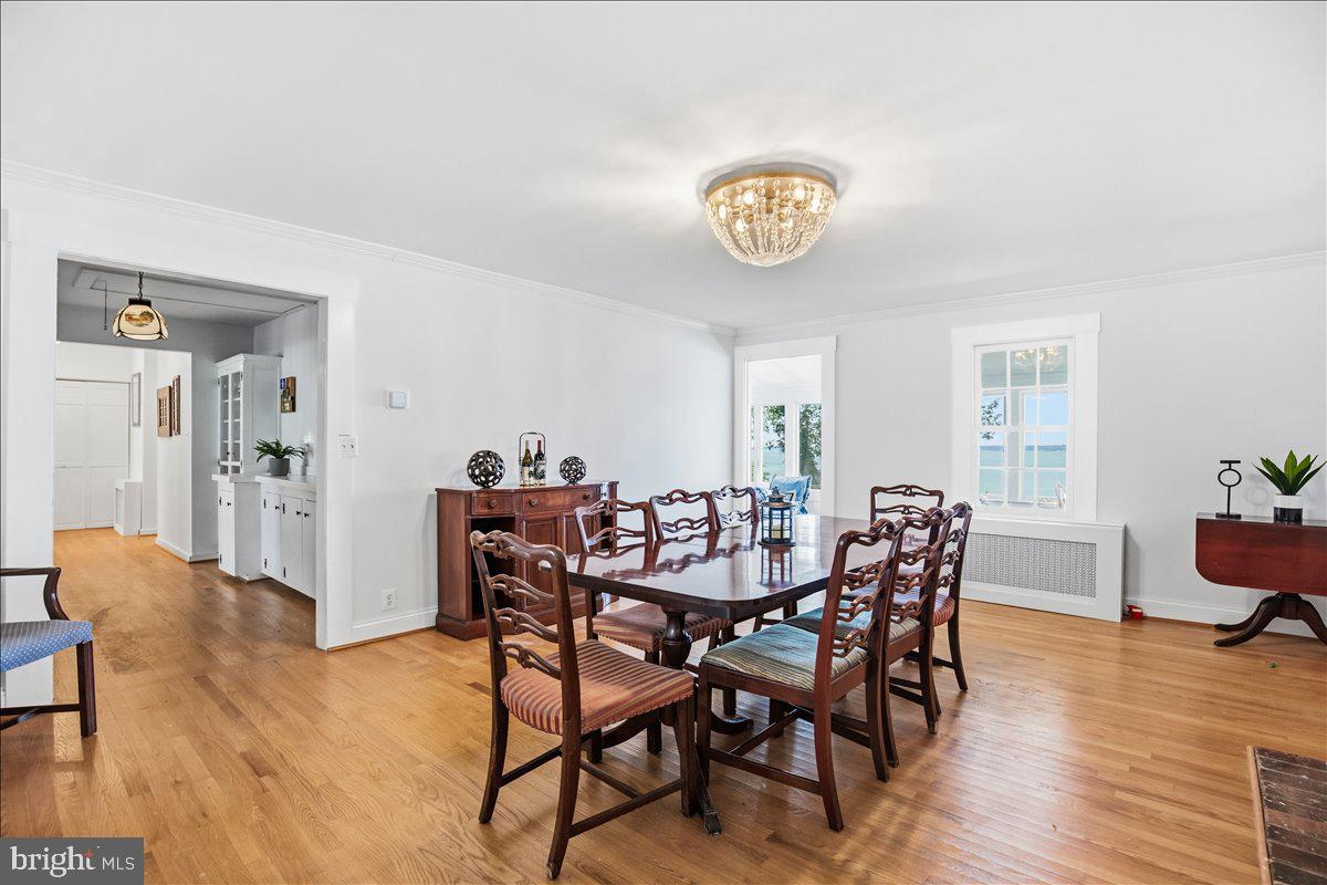 6110 Sheridan Point Road Prince Frederick, MD 20678 - Photo 30 of 77 Elegant dining space with natural light.