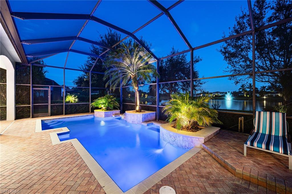 16839 Cabreo Drive Naples, FL 34110 - Photo 3 of 23 a view of a chairs and tables in the patio