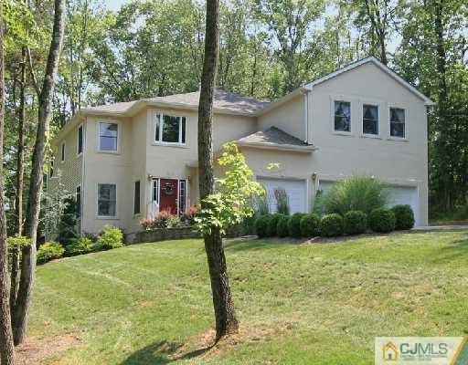 1100 Tullo Road Bridgewater, NJ 08836 - Photo 1 of 10 a front view of a house with garden