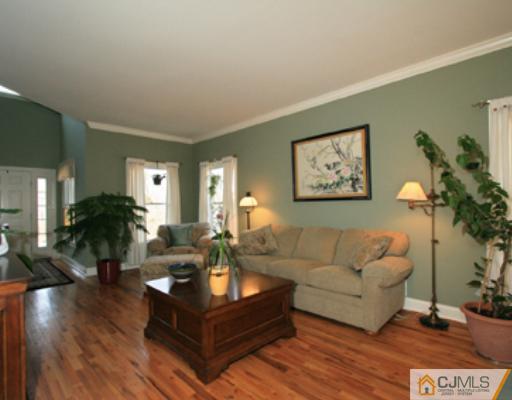 1100 Tullo Road Bridgewater, NJ 08836 - Photo 2 of 10 a living room with furniture and a large window