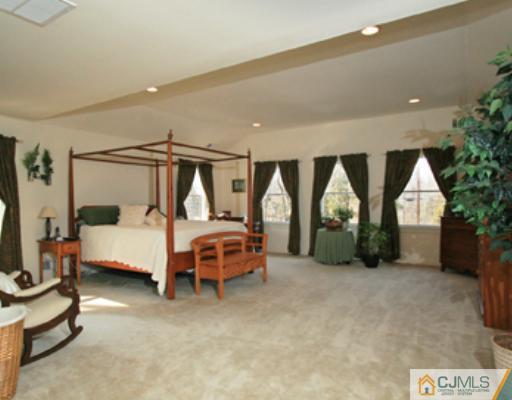1100 Tullo Road Bridgewater, NJ 08836 - Photo 6 of 10 a bedroom with furniture and a large window