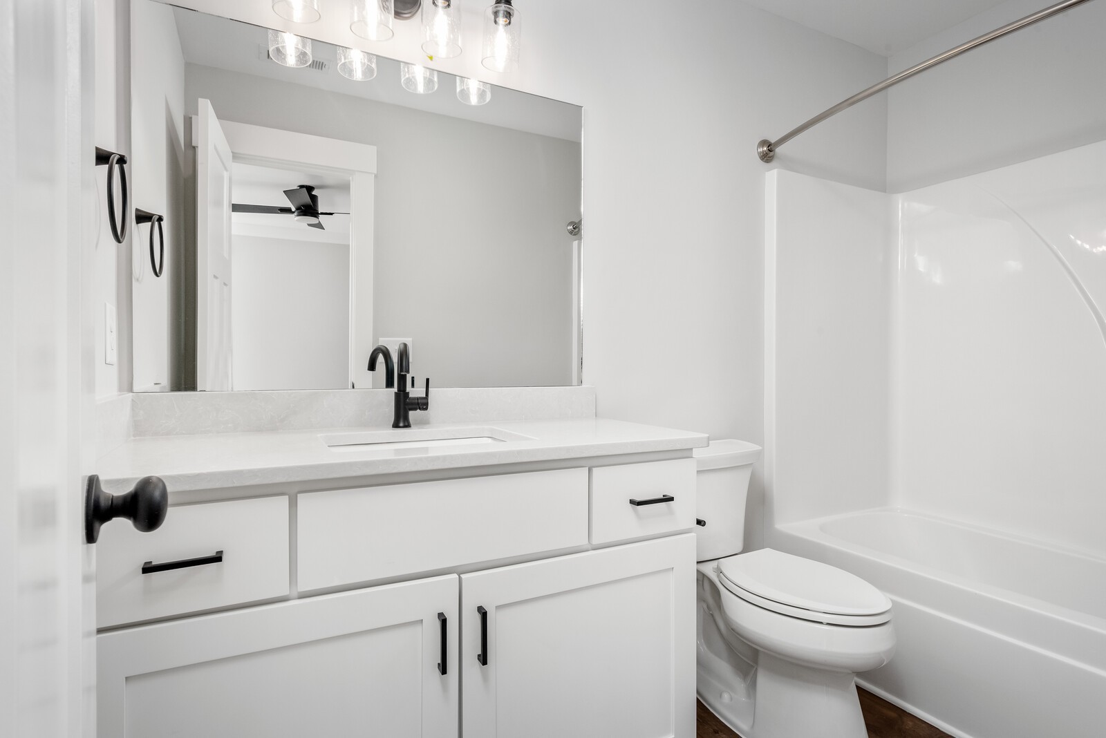 379 Beechcroft Road Spring Hill, TN 37174 - Photo 13 of 18 a bathroom with a sink a toilet and a mirror