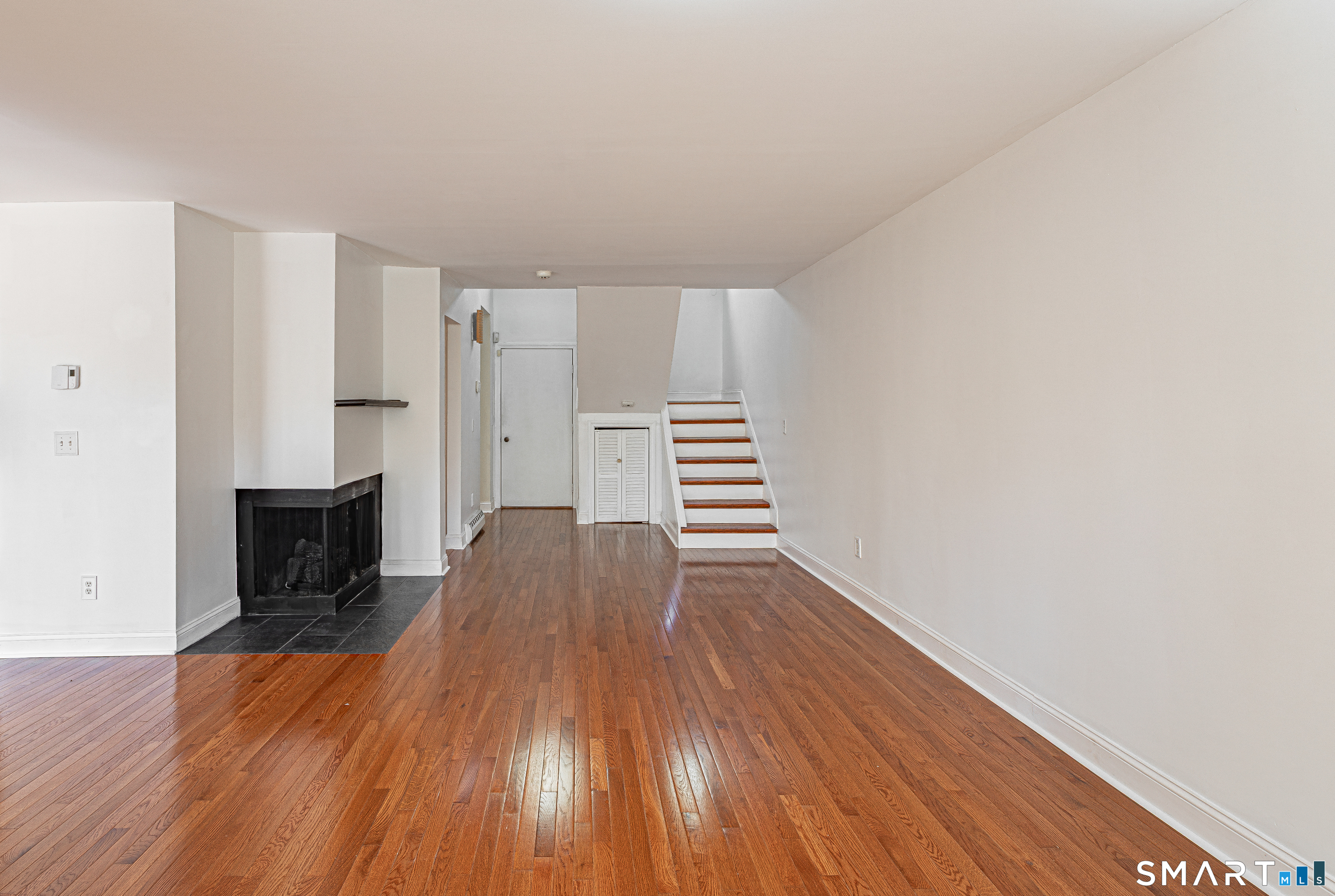 127 Old Farms Road, Unit 127 Torrington, CT 06790 - Photo 12 of 32 a view of kitchen and wooden floor