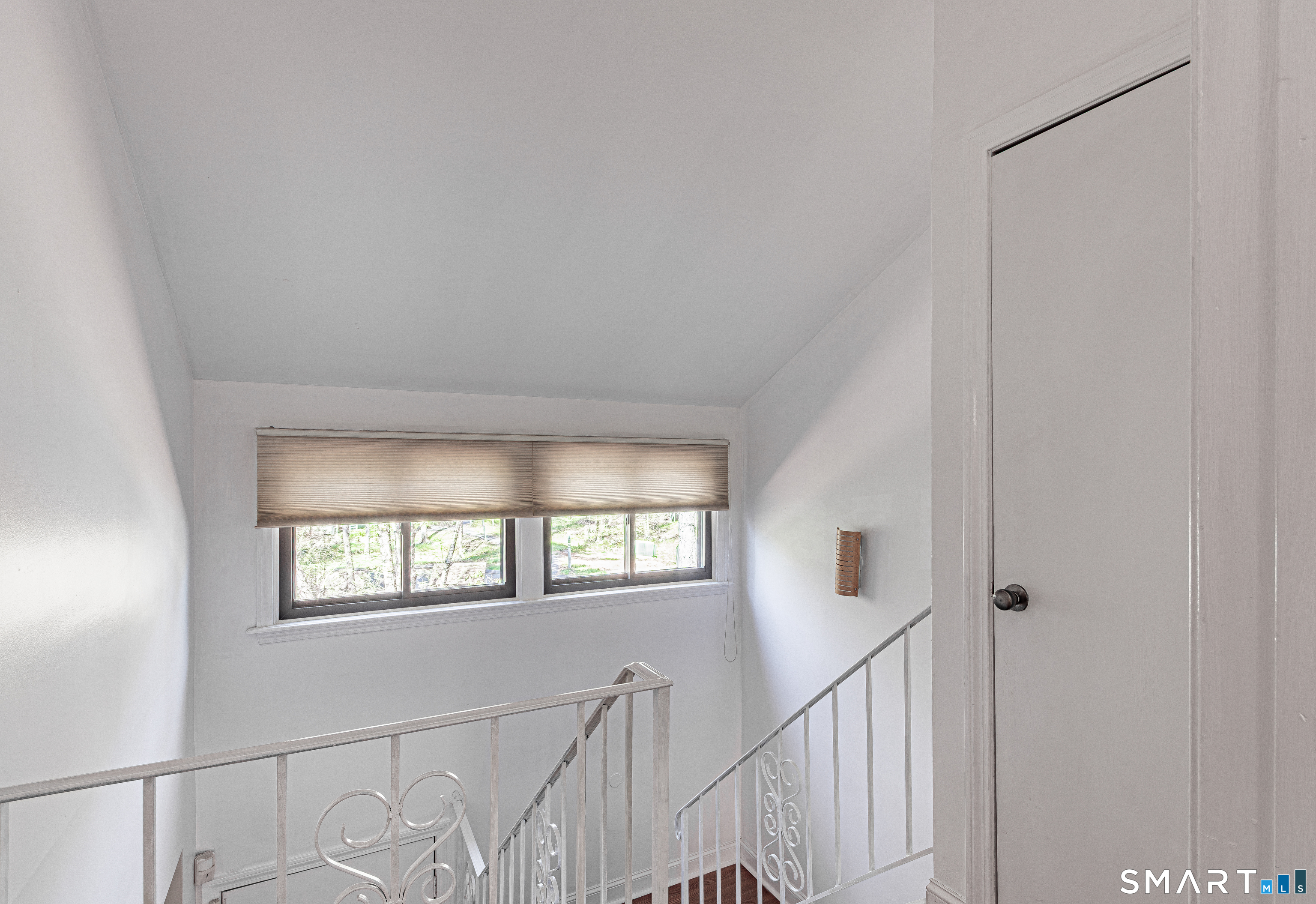 127 Old Farms Road, Unit 127 Torrington, CT 06790 - Photo 18 of 32 a view of an entryway with wooden floor