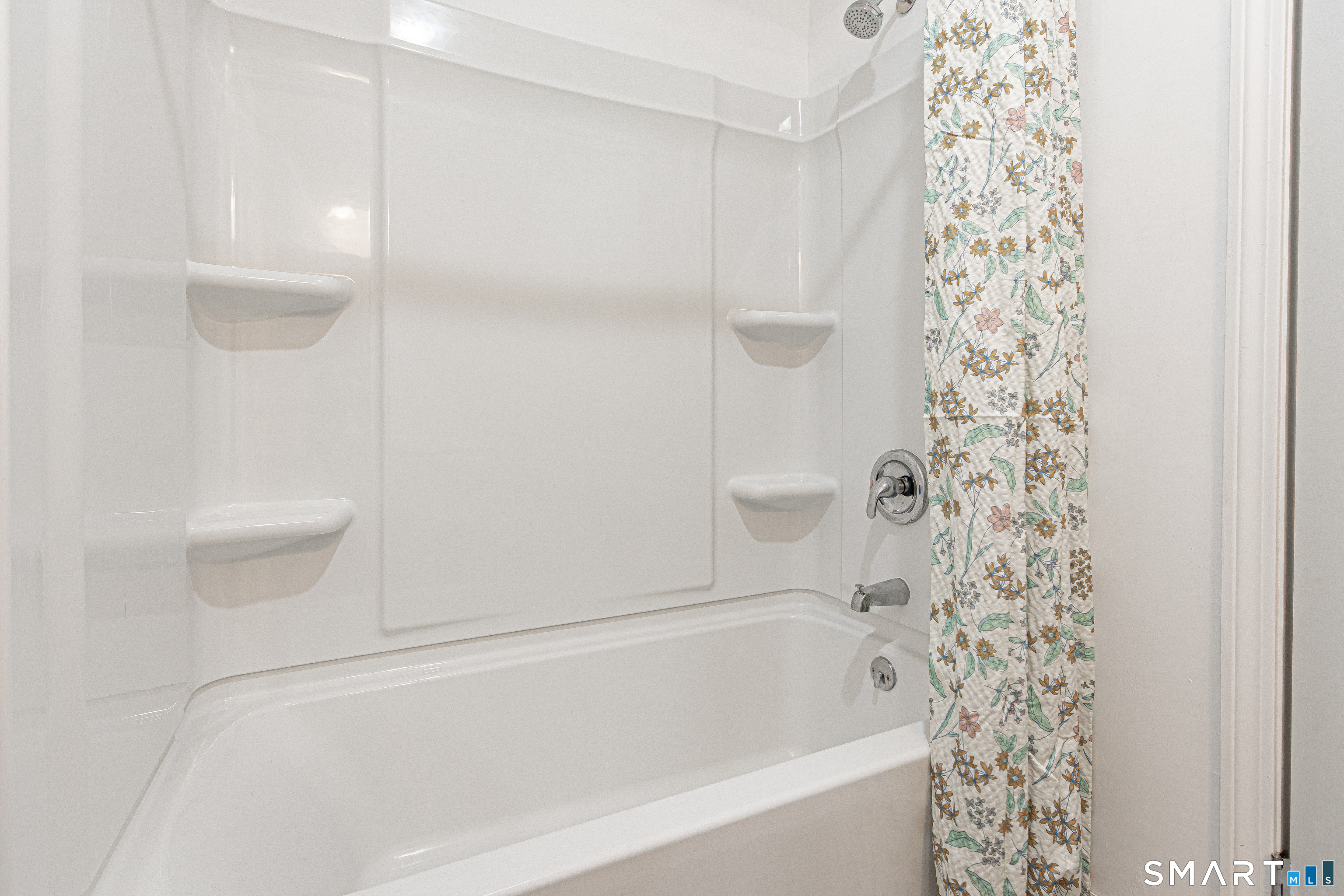 127 Old Farms Road, Unit 127 Torrington, CT 06790 - Photo 30 of 32 a bathroom with a bathtub and shower