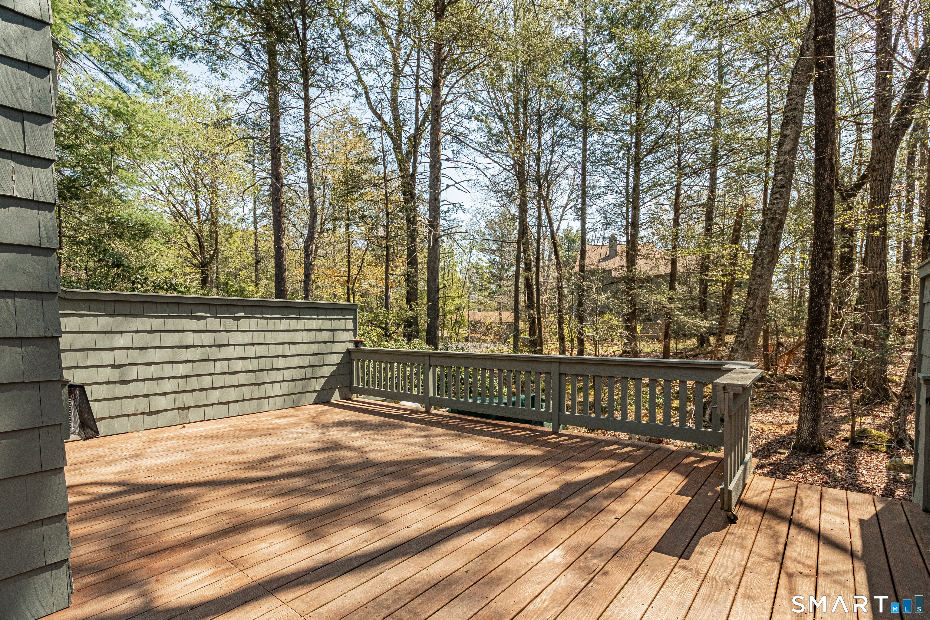127 Old Farms Road, Unit 127 Torrington, CT 06790 - Photo 4 of 32 a view of a wooden deck
