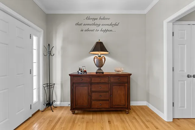 a room with a mirror and a table