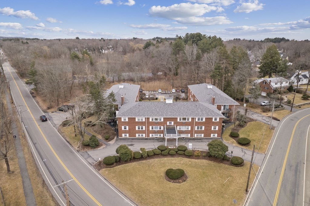 224 School Street, Unit 10 Walpole, MA 02081 - Photo 31 of 41 a view of a balcony with sitting area