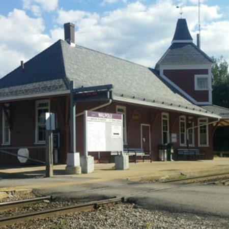 224 School Street, Unit 10 Walpole, MA 02081 - Photo 37 of 41 a front view of a house with a yard