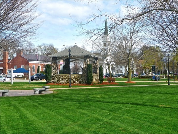224 School Street, Unit 10 Walpole, MA 02081 - Photo 41 of 41 a front view of a building with a garden