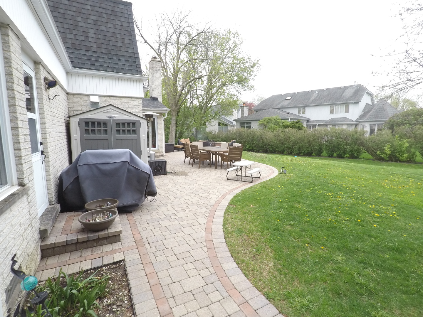 2053 Clover Road Northbrook, IL 60062 - Photo 3 of 28 a view of a patio in back of house