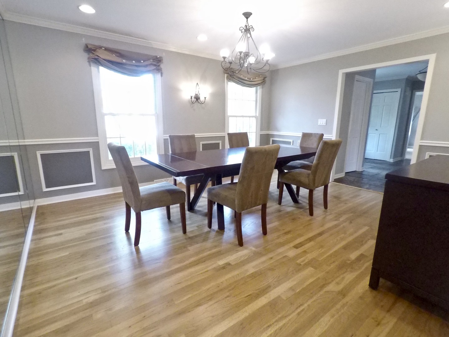 2053 Clover Road Northbrook, IL 60062 - Photo 4 of 28 a view of a dining room with furniture window and wooden floor