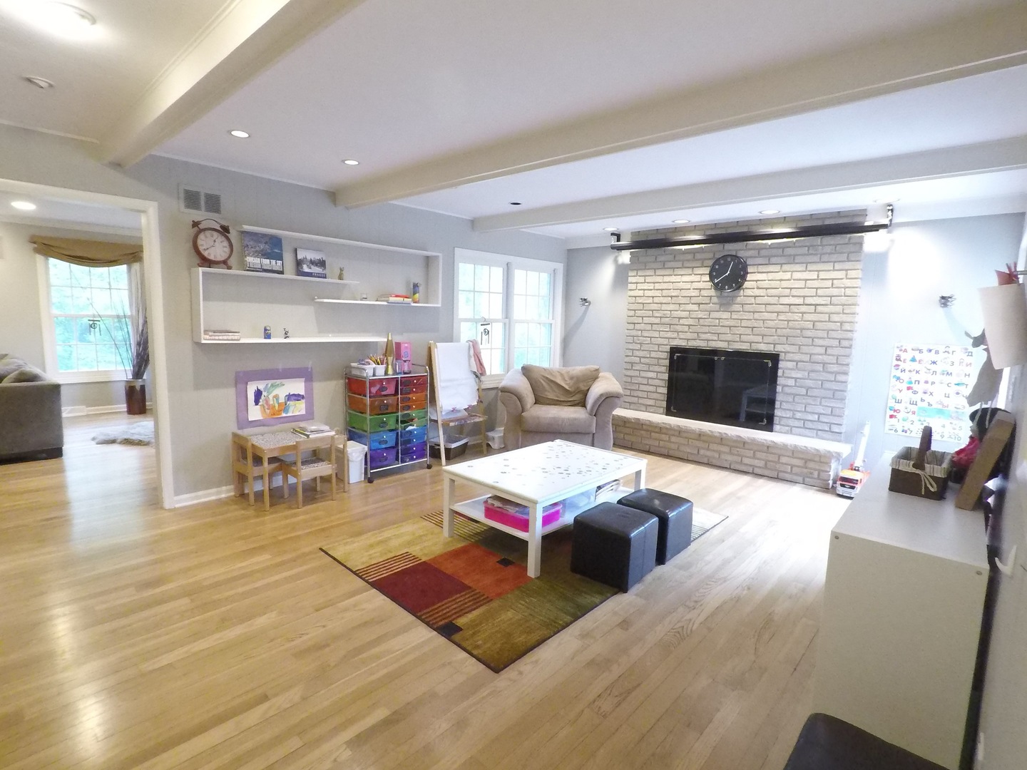 2053 Clover Road Northbrook, IL 60062 - Photo 9 of 28 a living room with furniture and a fireplace