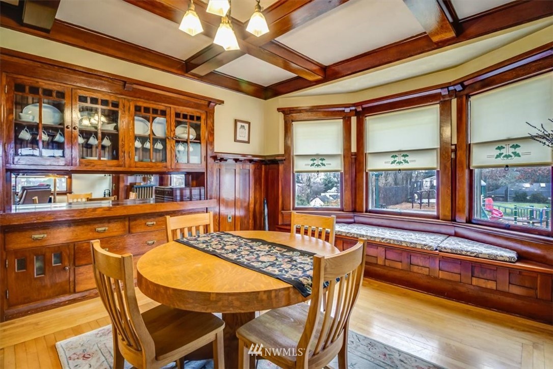 3602 Rockefeller Avenue Everett, WA 98201 - Photo 10 of 36 a dining room with furniture and a floor to ceiling window