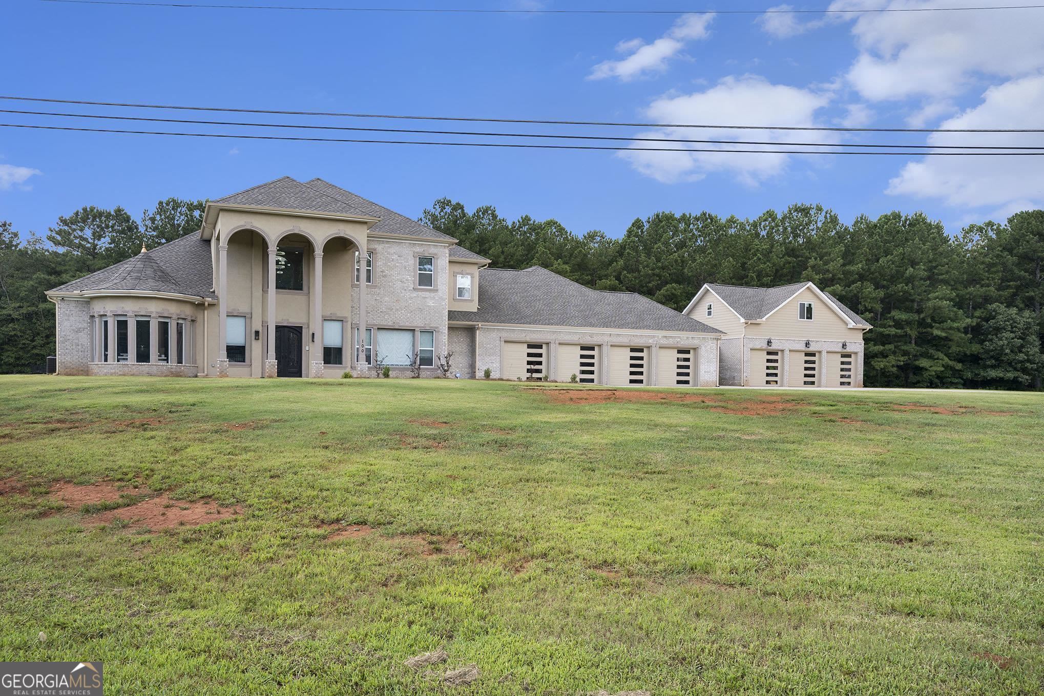 100 Brown Road Covington, GA 30016 - Photo 1 of 1 a view of house with garden