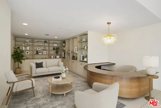 a living room with furniture and a lamp