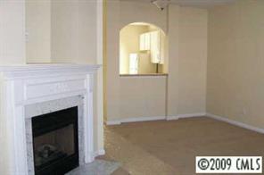 839 Gentlewinds Court, Unit 839 Fort Mill, SC 29708 - Photo 3 of 8 a view of a livingroom with a fireplace
