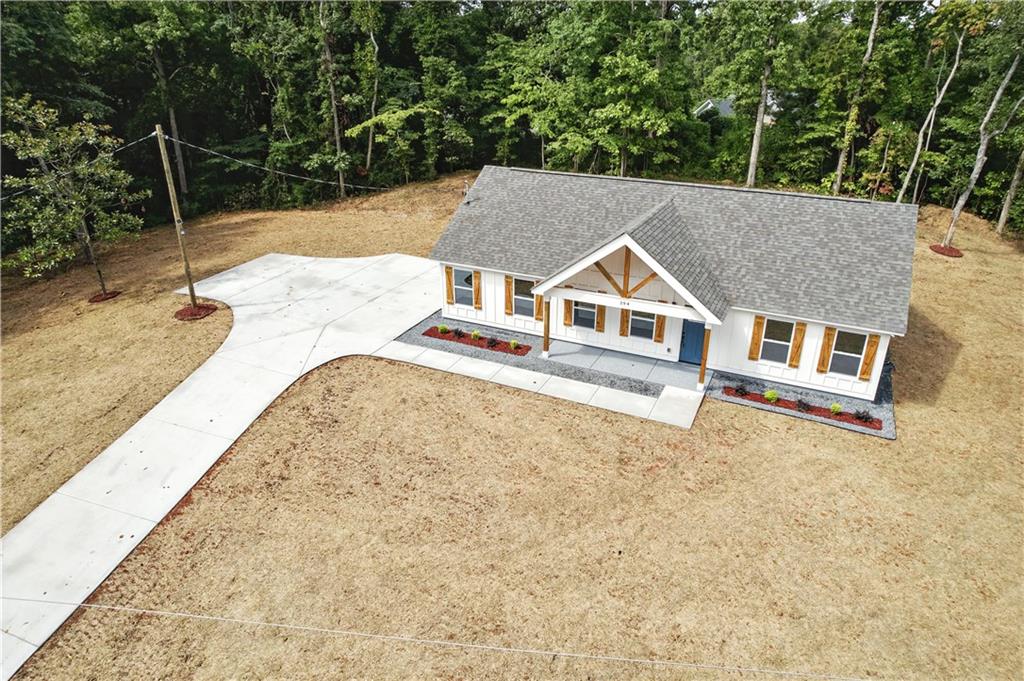 194 Harris Loop Dallas, GA 30157 - Photo 2 of 25 an aerial view of a house with a yard
